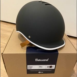 New in box.  Thousand Heritage cycling helmet.